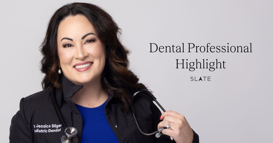 Dr. Slinger headshot. Woman smiling with dark hair and stethoscope around her neck.