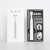 Slate Rechargeable Flosser in packaging. Contains flosser, four floss heads, and charging cable.